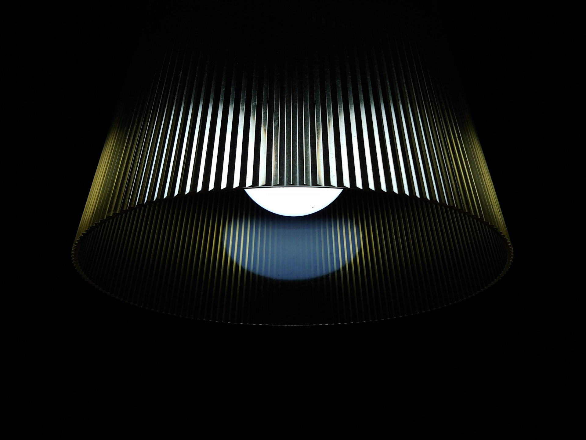 round black and brown pendant lamp